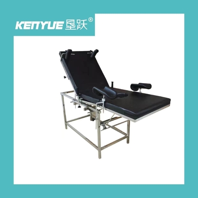 Cama obstétrico elétrica do hospital preto para a ginecologia