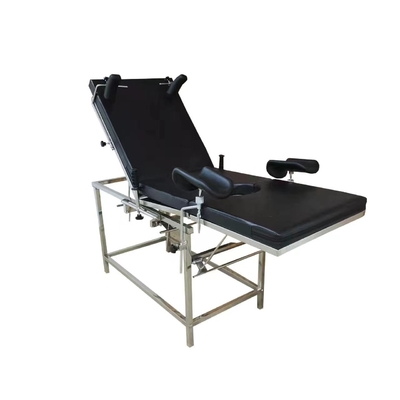 Cama obstétrico elétrica do hospital preto para a ginecologia