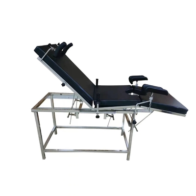 Cama obstétrico elétrica do hospital preto para a ginecologia