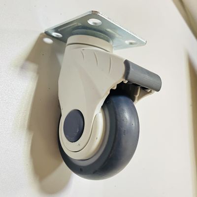 Os acessórios da cama de hospital gerenciem sobre um eixo as rodas médicas silenciosas do rodízio dos PP TPR