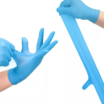 As luvas descartáveis do exame do hospital colorem luvas azuis do nitrilo três tamanhos